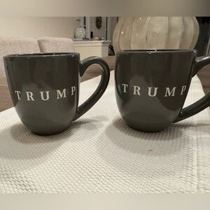 Set of Two Olive green large TRUMP mugs. Use but great condition.
